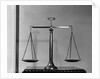 Balancing Scales On Table by Anonymous