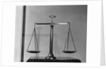 Balancing Scales On Table by Anonymous
