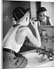 Boy Shaving at Mirror by Anonymous