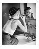 Boy Shaving at Mirror by Anonymous
