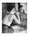 Boy Shaving at Mirror by Anonymous