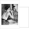Boy Shaving at Mirror by Anonymous