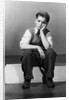 Boy in Dejected Pose by Corbis