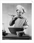 Boy Tasting His Cooking by Anonymous