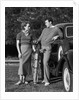 Couple Taking a Break from Tennis by Anonymous
