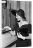 Young Woman At Bank Teller'S Window by Anonymous
