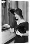 Young Woman At Bank Teller'S Window by Anonymous