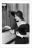 Young Woman At Bank Teller'S Window by Anonymous
