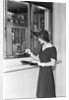 Woman At Bank Teller Window by Anonymous