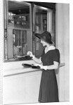 Woman At Bank Teller Window by Anonymous