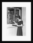 Woman At Bank Teller Window by Anonymous