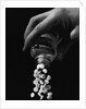 Hand Pouring Aspirin from Bottle by Anonymous