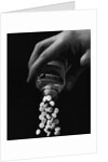 Hand Pouring Aspirin from Bottle by Anonymous