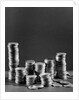 Stacks of Tarnished Silver Dollars by Anonymous