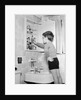 Boy Reaching into Medicine Cabinet by Anonymous