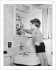 Boy Reaching into Medicine Cabinet by Anonymous