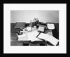 Desk Covered with Assorted Office Supplies by Anonymous