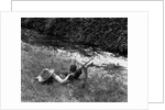 Boy Fishing with Hat Over Face by Anonymous
