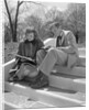 Students on Steps Reading by Anonymous