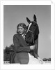 Teenage Girl with Her Horse by Anonymous