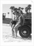Women in Bathing Suits Leaning Against Car by Anonymous
