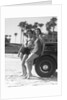 Women in Bathing Suits Leaning Against Car by Anonymous