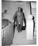 Policeman in Protective Gear Carries Bombs by Anonymous