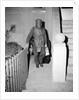 Policeman in Protective Gear Carries Bombs by Anonymous