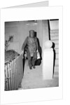 Policeman in Protective Gear Carries Bombs by Anonymous