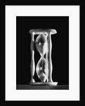 Sand Running Through Hourglass by Anonymous