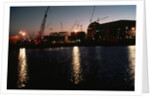 Nuclear Plant Silhouetted Against Sunset by Anonymous