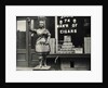 Wooden Statue In Front Of Cigar Shop by Anonymous