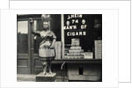 Wooden Statue In Front Of Cigar Shop by Anonymous
