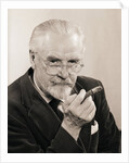 Bearded Man Holding a Cigar by Anonymous