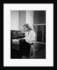 Woman and File Cabinet by Anonymous
