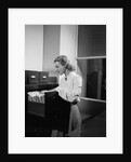 Woman and File Cabinet by Anonymous