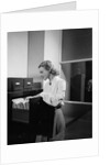 Woman and File Cabinet by Anonymous