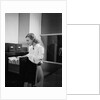 Woman and File Cabinet by Anonymous