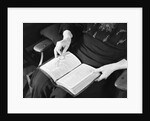 Bible in Woman's Lap by Anonymous