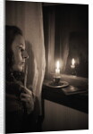 Woman at Window with Candle by Anonymous
