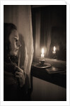 Woman at Window with Candle by Anonymous