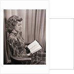 Seated Woman Reading Bible by Anonymous