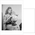 Woman Seated with Globe by Anonymous