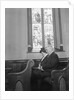 Couple Seated in Church Pew by Anonymous