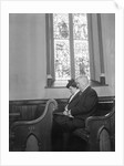 Couple Seated in Church Pew by Anonymous
