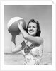Woman Holding Beach Ball by Anonymous