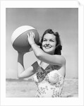 Woman Holding Beach Ball by Anonymous