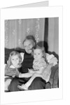 Two Girls on Grandfather's Lap by Anonymous