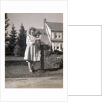 Woman Reading Mail by Mail Box by Anonymous