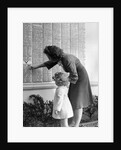 Woman And Daughter At Honor Roll Wall by Anonymous